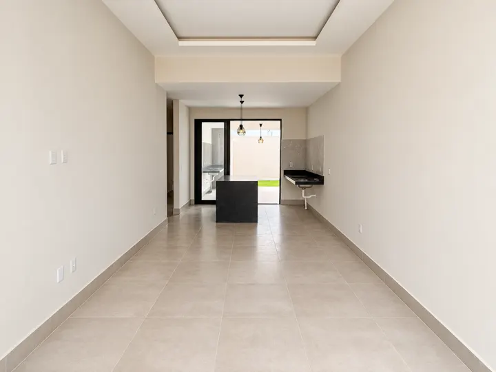 Sala integrada à cozinha da casa de 137 m²